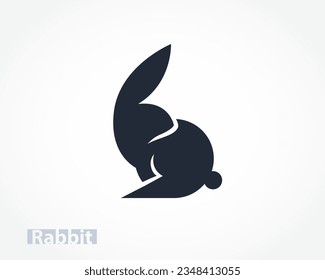 very simple abstract cartoon easter bunny rabbit looking back logo design template illustration
