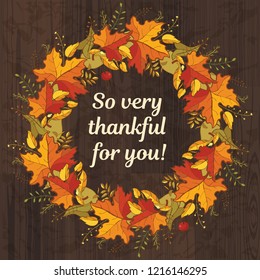 So very thankful for you. Template for Thanksgiving design. Colorful autumn leaves and text at dark wood background