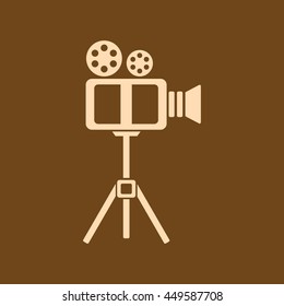 Very Useful Editable Vector icon of Video Camera on coffee color background. eps-10.