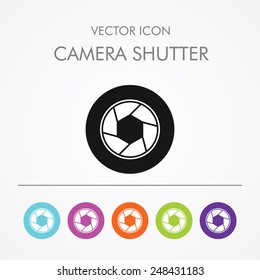 Very Useful Icon of Camera Shutter on Multicolored Round Buttons.