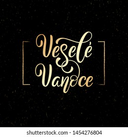 Vesele Vanoce on Czech language, phrase translate Merry Christmas. Happy winter holiday postcard with hand lettering holiday quote. Gold Czech calligraphy on black background.