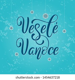 Vesele Vanoce on Czech language, phrase translate Merry Christmas. Happy winter holiday postcard with hand lettering holiday quote. Czech calligraphy on blue background with snow.