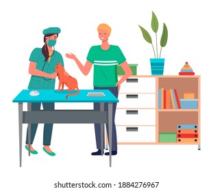 Vet doctor holds cat on examination table in clinic. Veterinarian works with a stethoscope and listens to the cat's heartbeat. Pets health care in vet clinic. Domestic animals treatment concept