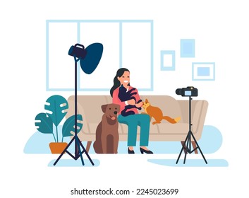 Veterinary blogger sits in front of camera with cats and dog. Woman records video blog about pets. Vlog streaming. Digital broadcast. Blogging for puppy or kitty owner