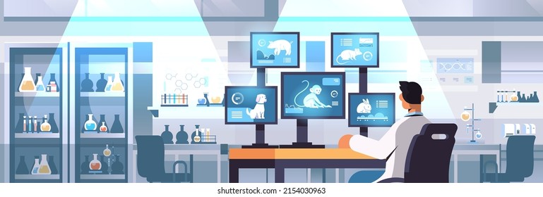 Veterinary Worker Work On Desktop With Animals On Screens Scientist Doing Experiments In Lab Biological Genetic Engineering Research