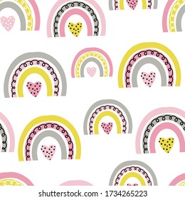 Vetor seamless pattern with cute rainbows. Pattern for baby girl room, wallpaper, kids and baby t-shirts and wear, hand drawn nursery illustration