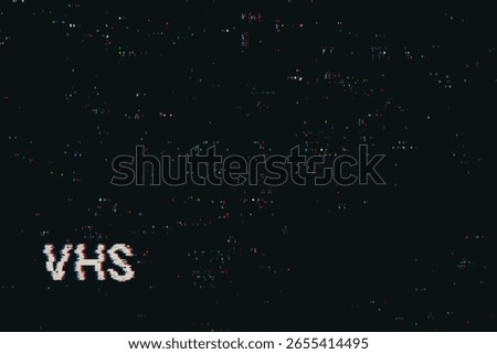 VHS text glowing with vintage video noise and glitch effects on a dark background. Retro technology concept for digital art.