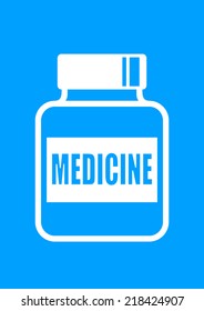 Vial of medicine on blue background  