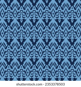 A vibrant abstract ikat pattern in shades of blue and black