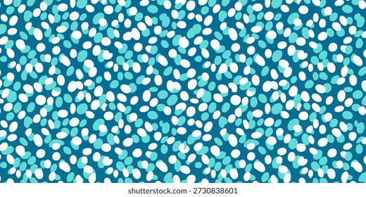 Un fondo abstracto azul vibrante con puntos blancos y azules dispersos vistos directamente desde arriba