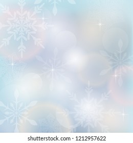 Vibrant defocused background. Bright bokeh with snowflakes. Christmas background with snowflakes and Christmas lights