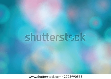 A vibrant image showcasing a background filled with soft, blurred blue lights. The lights are scattered across the image, creating a dreamy and ethereal atmosphere. The predominant blue hues are complemented by subtle hints of other colors, adding depth and visual interest.