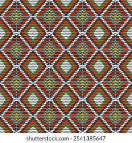 A vibrant and intricate knit pattern featuring a bold geometric design. The pattern showcases a repeating motif of interlocking diamonds and circles in shades of green, orange, white, and gray against