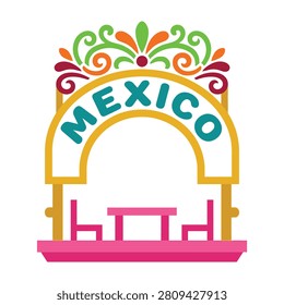 Vibrant Mexico archway with pink table and chairs, colorful floral design