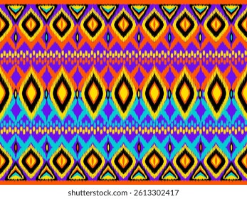 Vibrant multicolor ikat pattern with bold diamond motifs in purple, orange, turquoise, and yellow. Ethnic seamless design ideal for textiles, home decor, and creative projects.