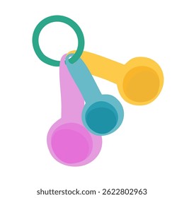Vibrant pastel-colored measuring spoons with a green ring, playfully arranged against a clean white background.