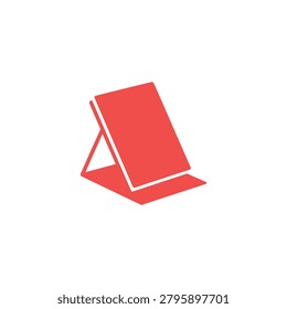 A vibrant red folding beach chair with sturdy legs open and ready for use at the seaside or outdoor events