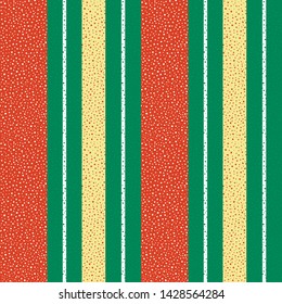 Vibrant red, gold and white dotted vertical striped design. Seamless geometric vector pattern on textured green background. Great for Christmas, seasonal products, packaging, stationery giftwrap