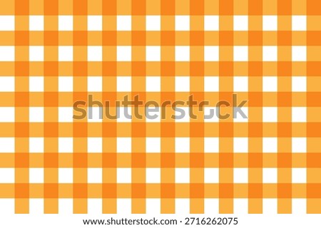 A vibrant and repeating orange and white checkered pattern dominates the entire frame creating a simple visual texture