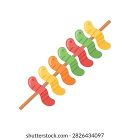 A vibrant skewer of assorted gummy worms, showcasing a playful and sweet treat.
