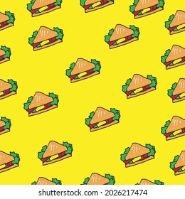 Vibrant Toasted Delight: Dive into the vibrancy of a triangular sandwich featuring lettuce, cheese, and meat on a yellow background. Perfect for creating captivating wallpapers and wrapping paper.