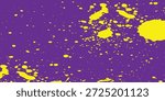 Vibrant Yellow Paint Splatter on Deep Purple Background