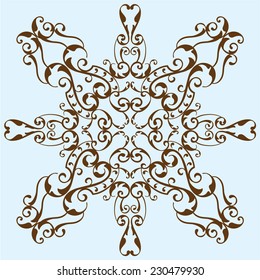 Victorian swirl flower is on blue