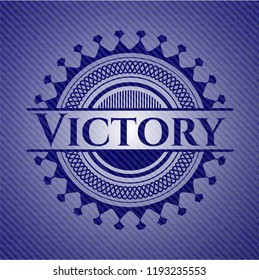 Victory badge with denim texture