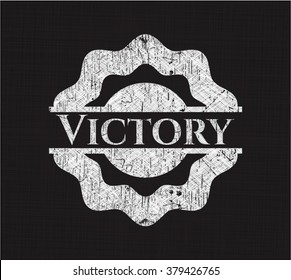 Victory chalkboard emblem written on a blackboard