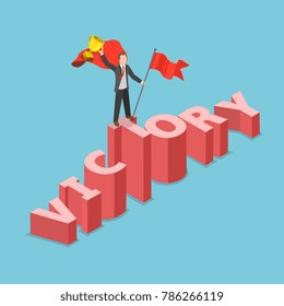 Victory flat isometric vector concept. Businessman dressed with superhero cloak with flag and winner cup in his hands is standing on the three dimensional word VICTORY that pictured like a mountain.