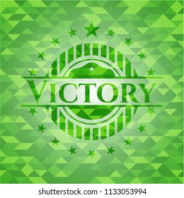 Victory green emblem with mosaic background