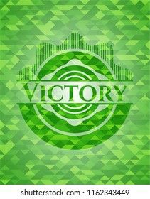 Victory green emblem. Mosaic background