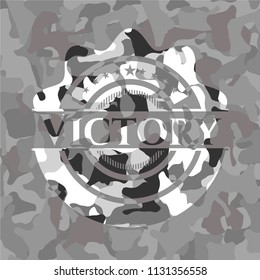 Victory on grey camouflaged texture