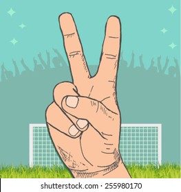 victory sign with a stadium in the background 