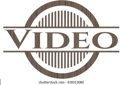 Video badge with wooden background