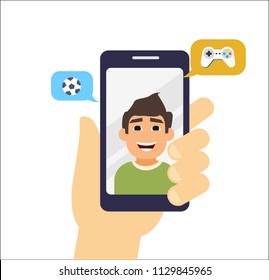 video call with friend. talking about game and sport. video call with smarthphone. video call with friends. Incoming call on smartphone screen. Calling service. Hand holds smartphone, 