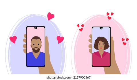 Video call with your loved one. A hand holds a smartphone with a man and a woman on the screen. Online dating, long distance relationships.