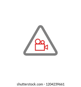 Video camera alert symbol with warning triangle 