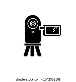 Video camera black glyph icon. Digital recording gadget. Electronic motion picture. Filming, shooting. Portable camcorder. Technology. Silhouette symbol on white space. Vector isolated illustration