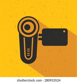 Video camera design on yellow background,flat design,clean vector