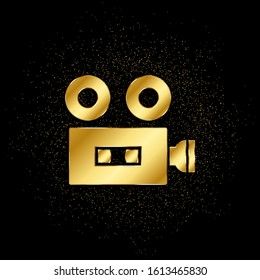 video camera gold icon. Vector illustration of golden particle background.