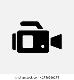 Video camera icon designed in a solid style