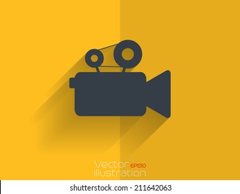 Video camera icon with long shadow on yellow background