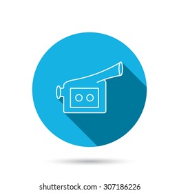 Video camera icon. Retro cinema sign. Blue flat circle button with shadow. Vector