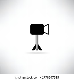 video camera on tripod icon with shadow on white background