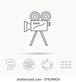 Video camera with reel icon. Retro cinema sign. Global connect network, ocean wave and chat dialog icons. Teamwork symbol.