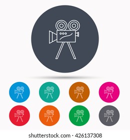 Video camera with reel icon. Retro cinema sign. Icons in colour circle buttons. Vector