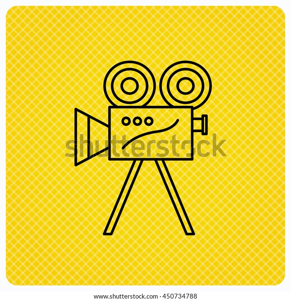 Video camera with reel icon. Retro\
cinema sign. Linear icon on orange background.\
Vector