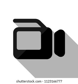 Video camera with screen. Black object with long shadow on white background