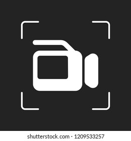 Video camera with screen. White object in camera autofocus on dark background